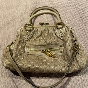 Marc Jacabs tan snakeskin bag with gold studs and accents